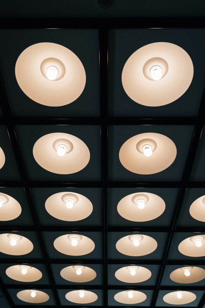 Recessed ceiling lights in a dark room